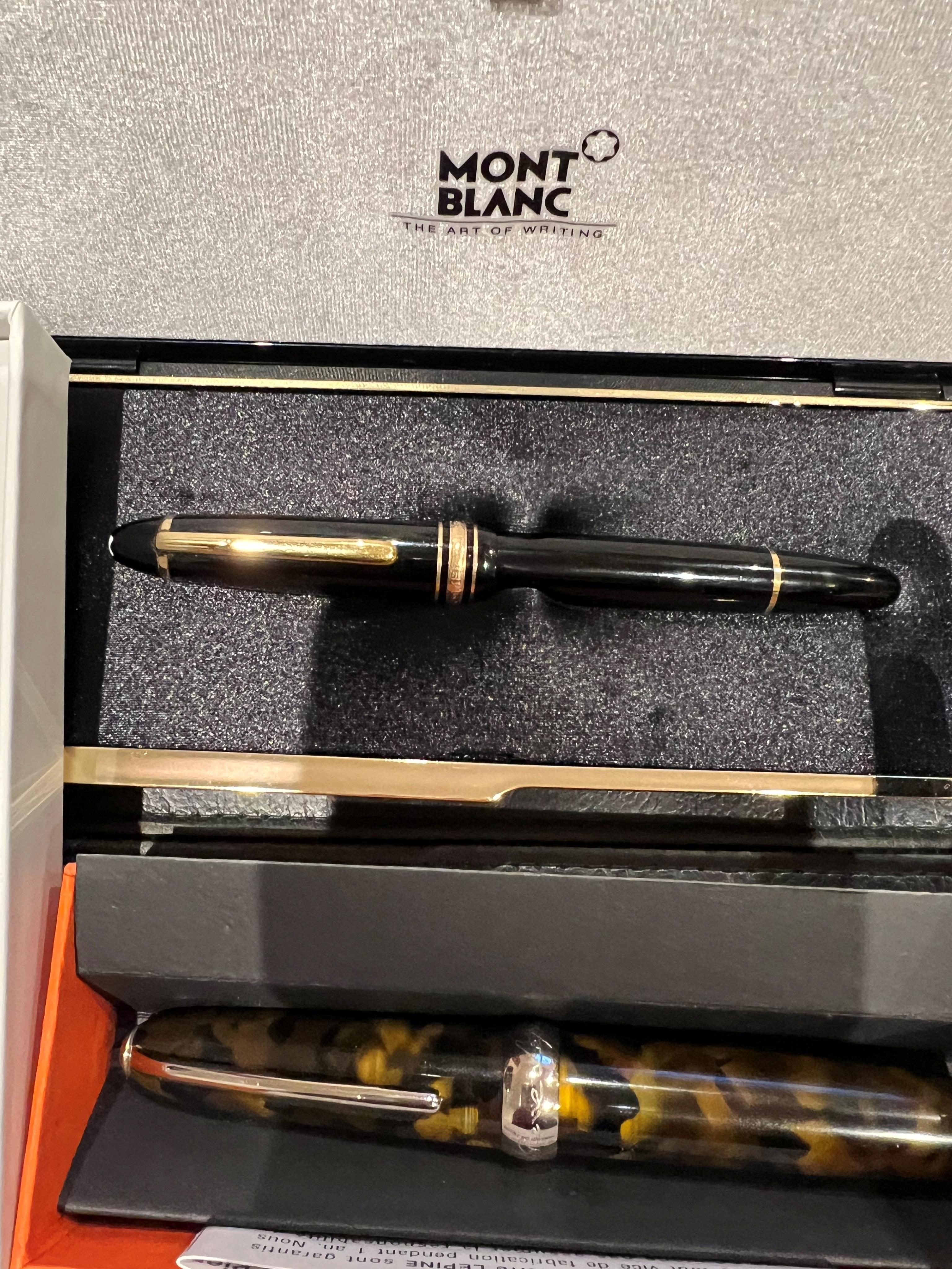 A Montblanc 146 vintage fountain pen, in original case, along with Aurora fountain pen and two others (4)